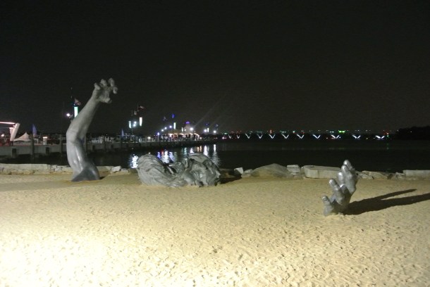 Like "The Awakening." A sculpture on the beach in National Harbor that looks like a man emerging from the sand. Created by J. Seward Johnson.