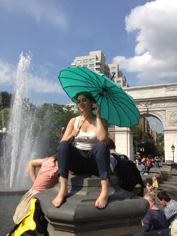 A beautiful green parasol in Washington Park on a sunny day.