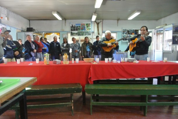 UST Workers spending time together, playing music for us, after lunch.